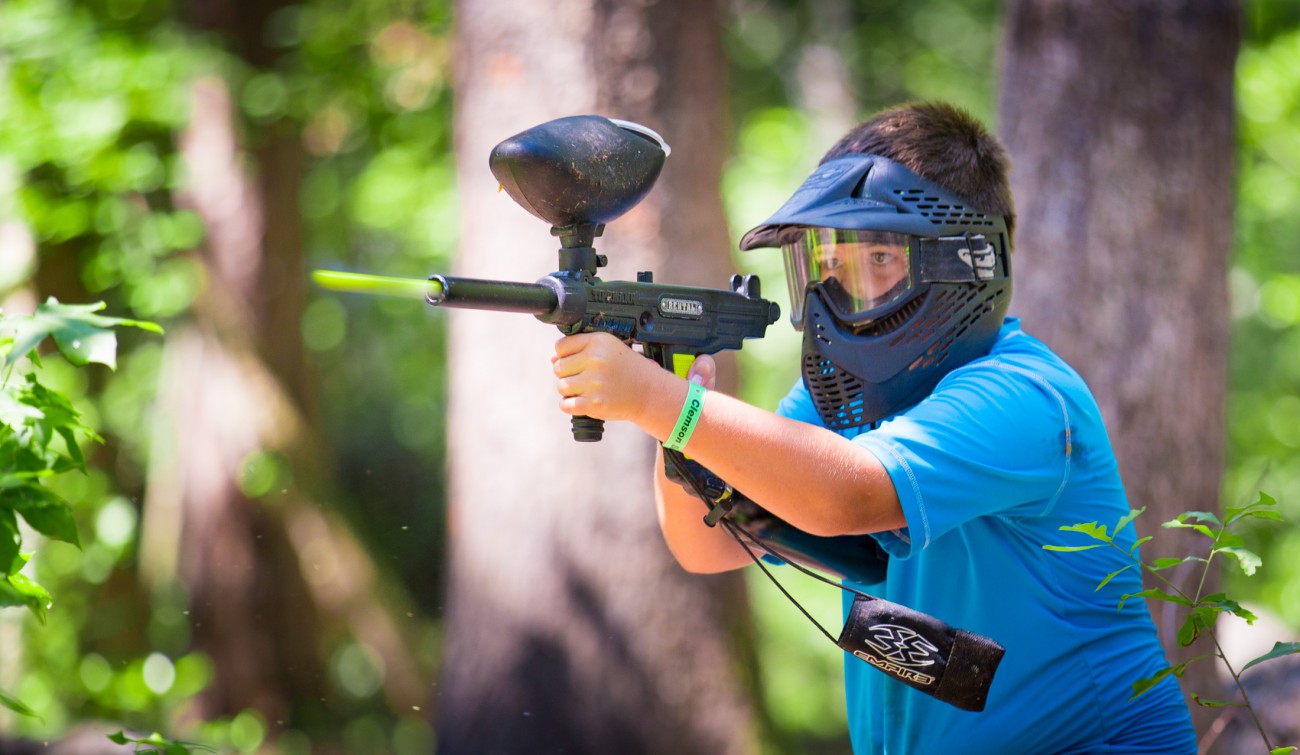 Student playing paintball.