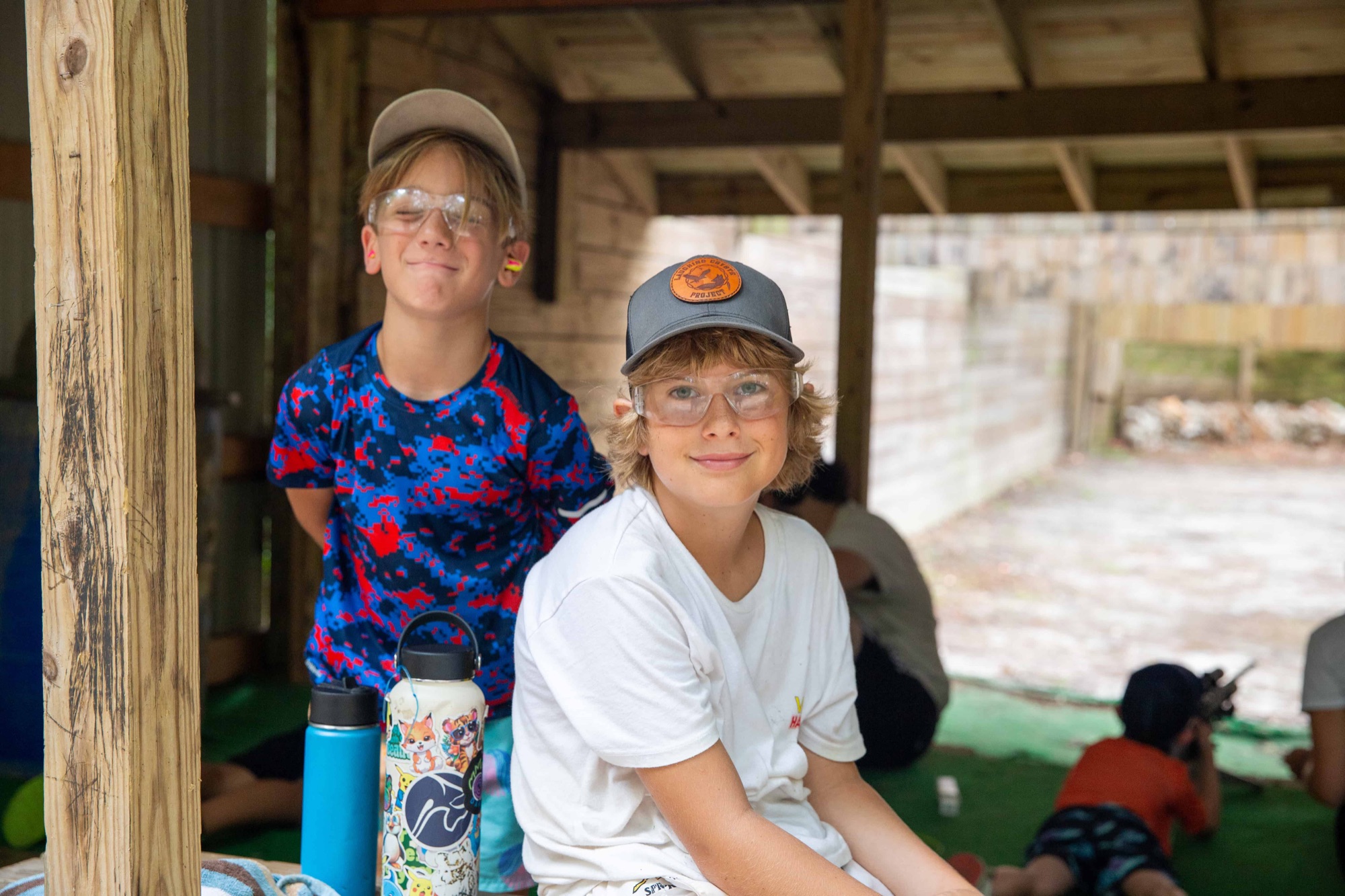 Two boys at shooting range